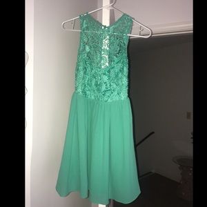 Beautiful teal lace dress.